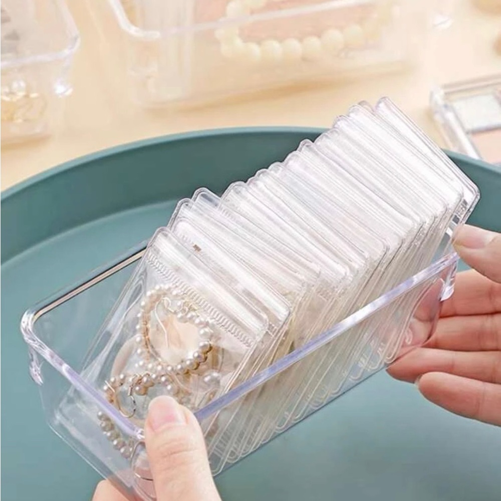 Jewelry box organizer tray with clear storage zipped bags. Perfect for drawers